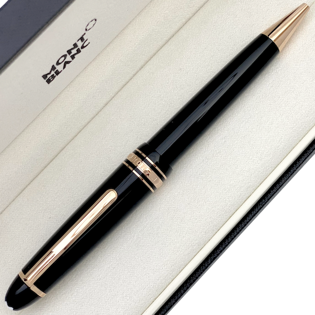 schwarzer Montblanc Kugelschreibermine mit rot goldenen Beschlägen und Clip