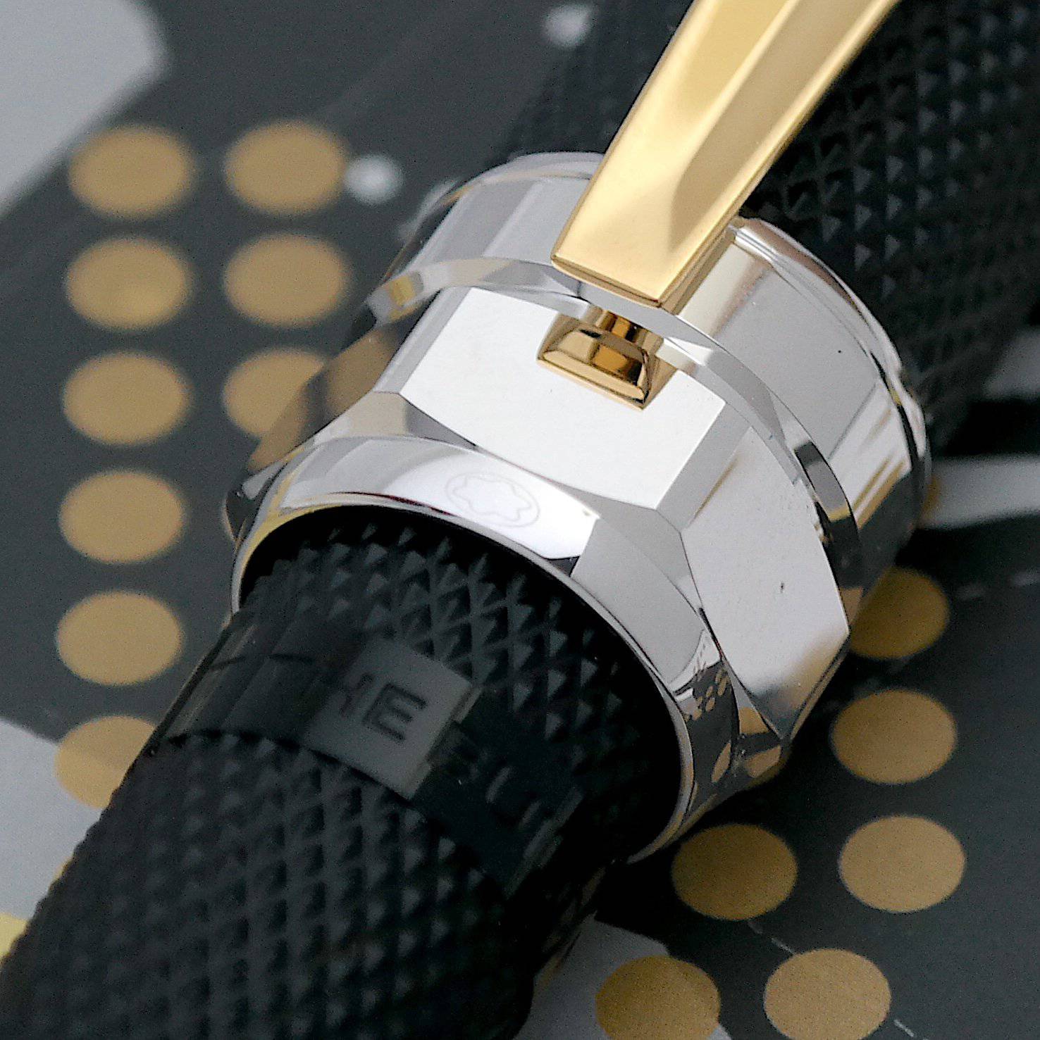 Silberner Beschlag, in Zündkerzen-Optik mit einem gravierten Spruch